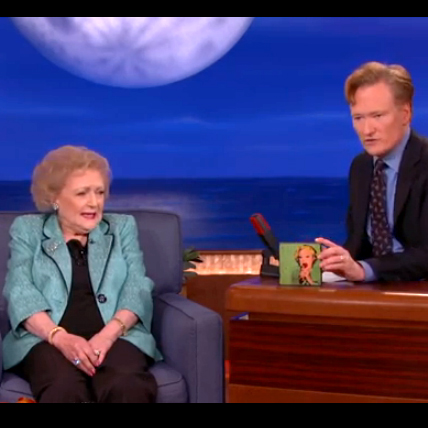 Betty White looks at a ModBlock made by Marcus Bellon on the Conan O'Brien Show